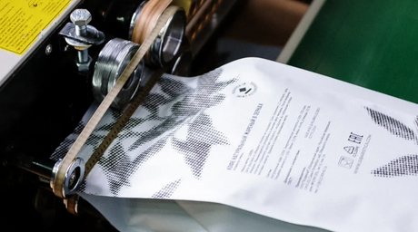 How a non woven bag making machine works.png